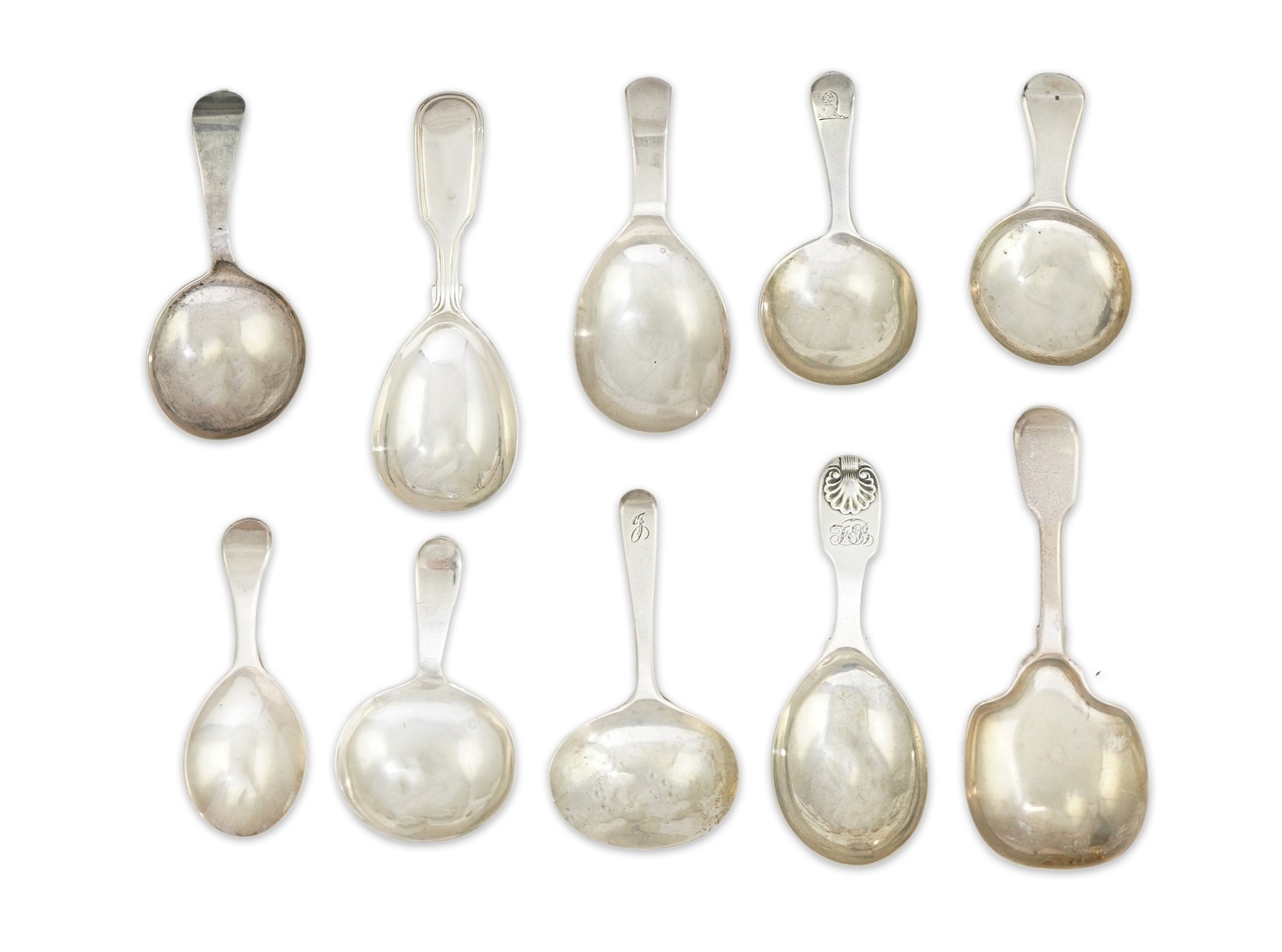 Ten assorted mainly 19th century silver caddy spoons, including seven Old English pattern, one fiddle pattern, one fiddle and thread pattern and one fiddle and shell pattern